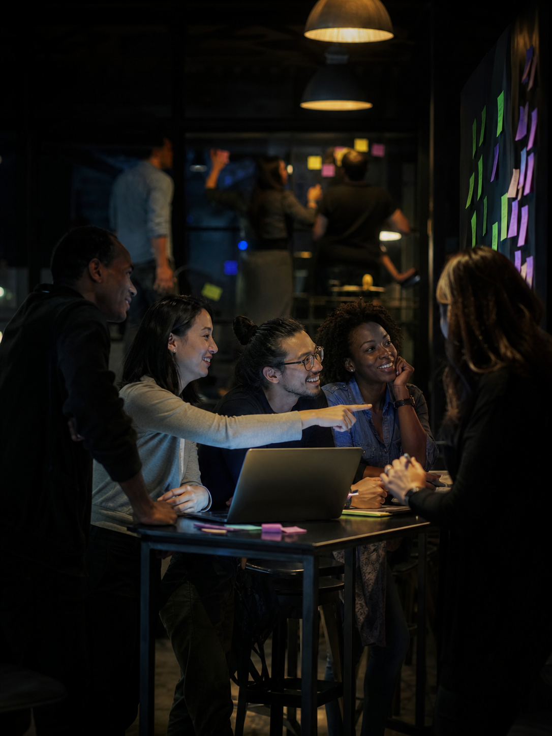 Team Collaboration in Atmospheric Workshop at Night